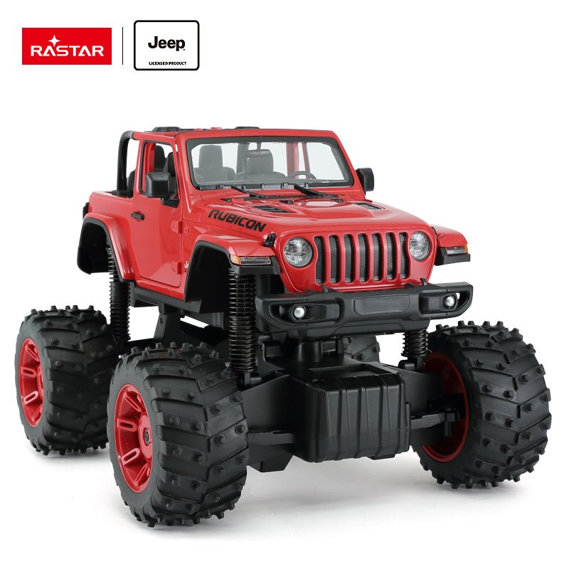 Rastar 1:14 Jeep Wrangler Rubicon Big Foot RC car in red shown from a front 3/4 angle with doors closed and soft-top removed, highlighting the open cabin, Rubicon bonnet decal, round headlights, and massive knobby bigfoot tyres with red rims.