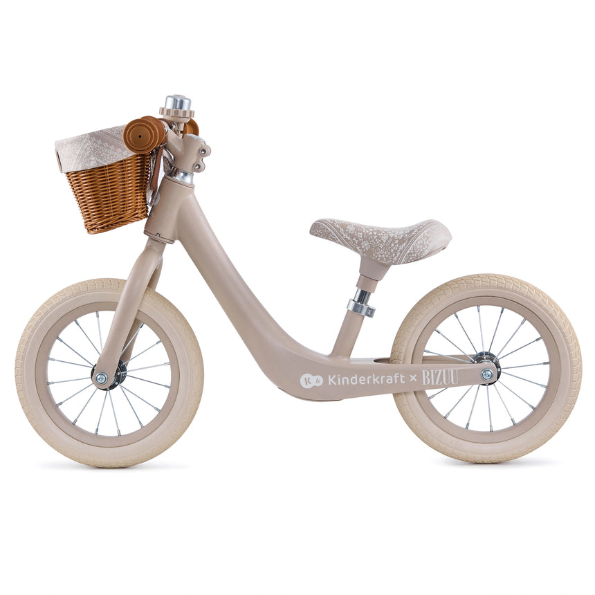 Wicker basket on the front of the Kinder Kraft Rapid 2 Whisper Dune balance bike