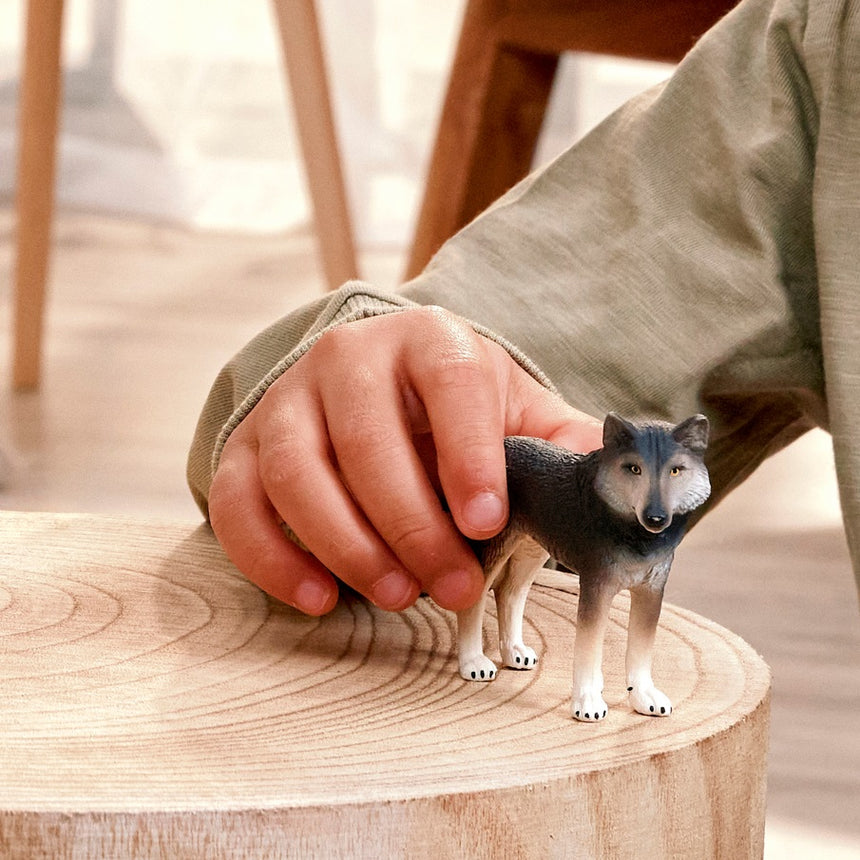 Schleich Wolf toy figure in play scene