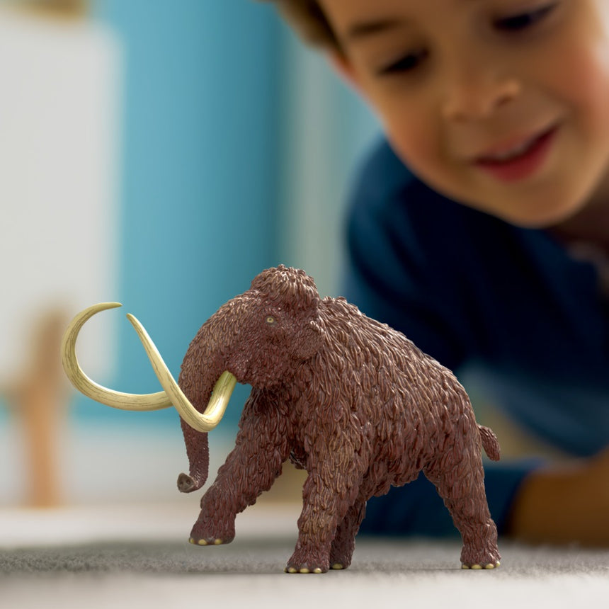 Schleich Mammoth toy figure in play scene