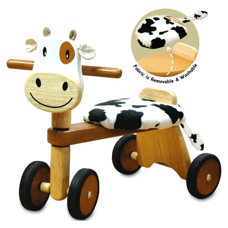 Detail of the I'm Toy Paddie Rider Calfie wooden ride-on cow