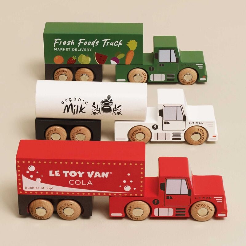 Le Toy Van Wooden Toy Trucks three FSC wood electric trucks with trailers – view 2