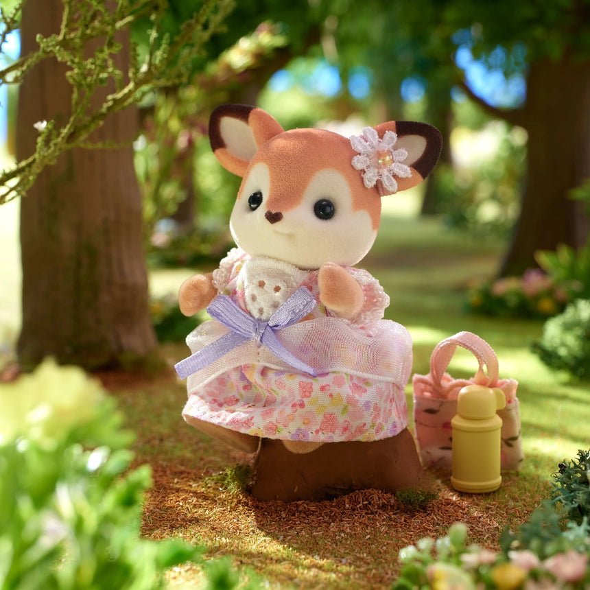 Sylvanian Families Deer Family girl figure with handbag in forest scene