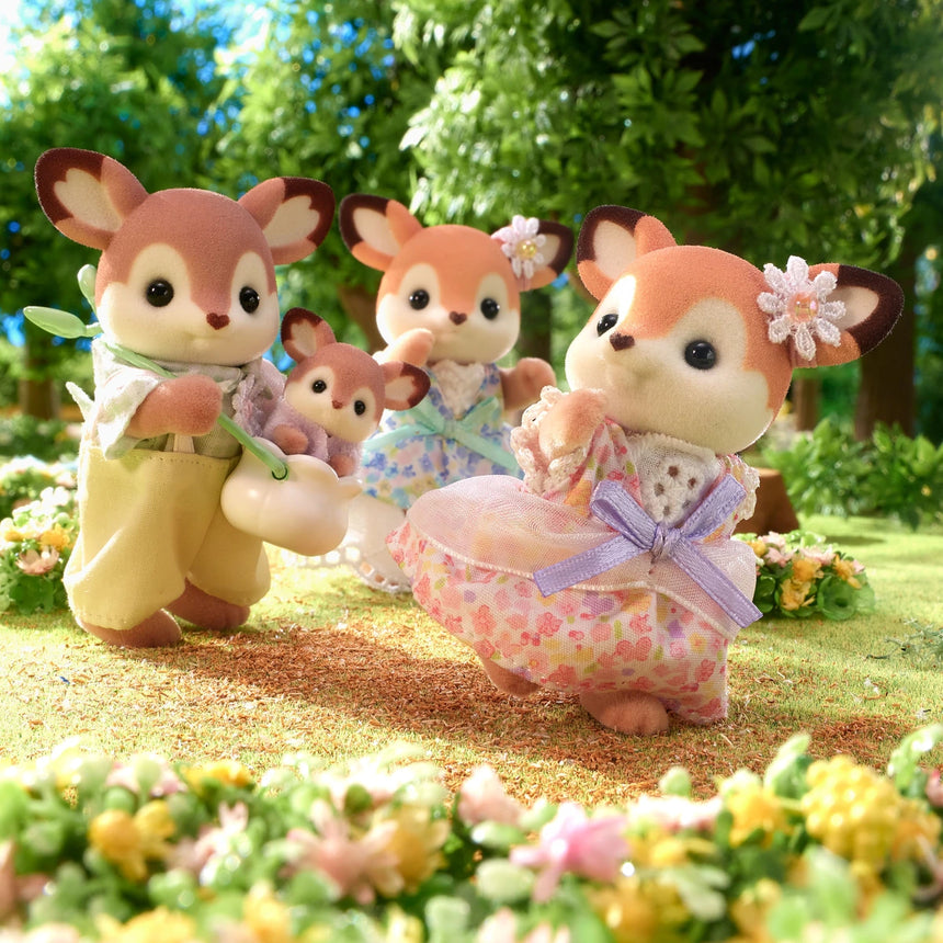 Sylvanian Families Deer Family figures in a sunny flower garden scene