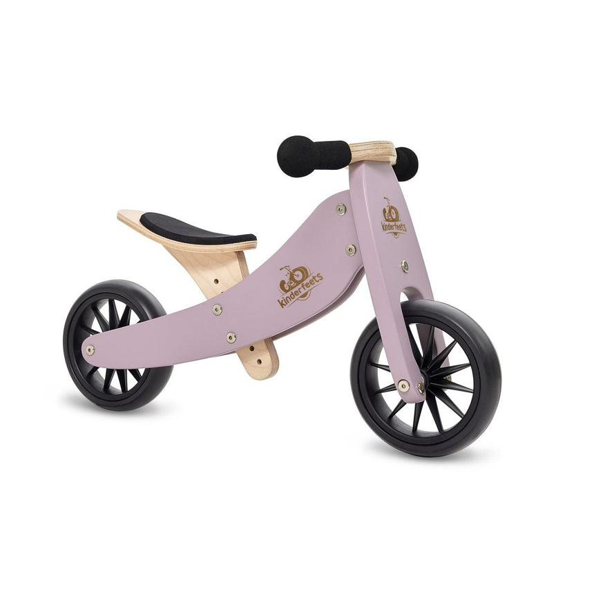 Kinderfeets Tiny Tot Lavender wooden balance bike in two-wheel mode, side view