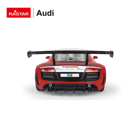 Rastar 1:14 Audi R8 LMS Performance RC car in red and white #15 "Audi Top Service" race livery, photographed from a straight rear angle revealing the full-width rear diffuser, twin exhaust outlets, "Audi Top Service" rear panel badging, and Audi four-ring logo on the large rear wing end plates.