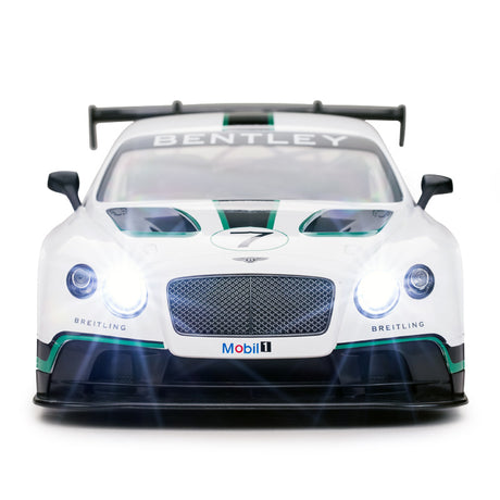 Rastar 1:14 Bentley Continental GT3 RC car in white with green hood stripes and number 7 shown front-on with LED headlights illuminated, displaying the mesh grille, Bentley badge, Breitling sponsor logos, and Mobil 1 decal on the front splitter.