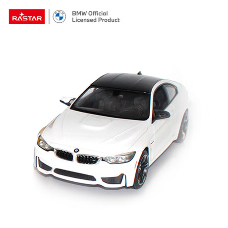 Rastar BMW M4 Coupe 1:14 RC car in white, photographed from above in a front 3/4 overhead angle showing the panoramic glass roof, bonnet contours, and twin-kidney black grille, with Rastar and BMW branding.