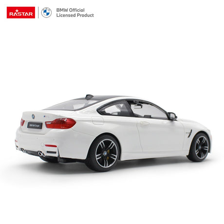 Rastar BMW M4 Coupe 1:14 RC car in white, rear 3/4 view showing the fastback roofline, quad exhaust tips, M4 Coupe badging on the boot lid, and red LED tail light clusters, with BMW Official Licensed Product branding.