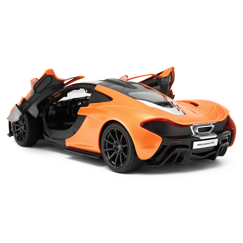 Rear 3/4 view of the Rastar 1:14 McLaren P1 RC car in orange with both dihedral doors open, showing the active rear wing, carbon-effect diffuser, McLaren P1 badging, and signature dual exhaust outlets.