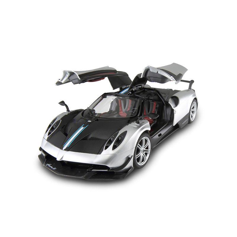 Rastar 1:14 Pagani Huayra BC RC car in silver and carbon fibre two-tone finish, elevated front 3/4 view with both gull-wing doors open revealing the red interior cabin.