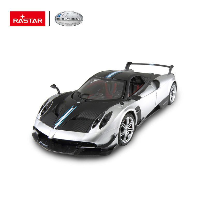 Rastar 1:14 Pagani Huayra BC RC car in silver and carbon fibre finish, front 3/4 view with doors closed showing the Rastar and Pagani authorized logos, aggressive aero bodywork, and rear wing.
