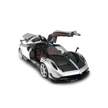 Rastar 1:14 Pagani Huayra BC RC car in silver and carbon fibre finish, elevated front 3/4 view with both gull-wing doors open, showing the Huayra BC script on the sill and red interior visible through the open cabin.