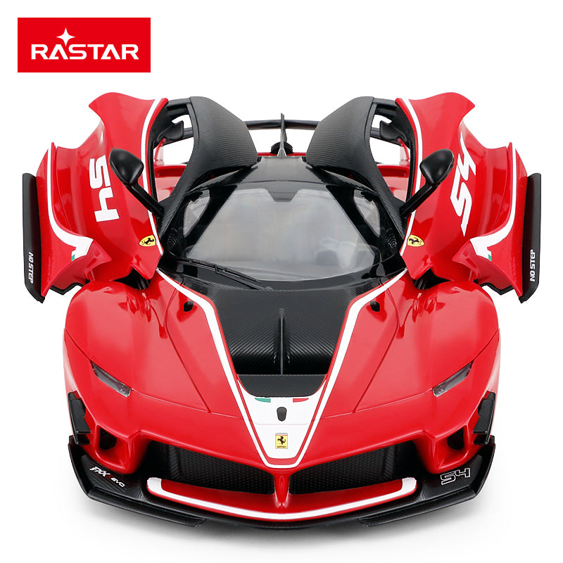 Rastar 1:14 Ferrari FXX K EVO RC car in red with number 54 race livery viewed directly front-on with both butterfly doors open wide, showing the Ferrari prancing horse badge, carbon-effect front splitter, and front headlights.