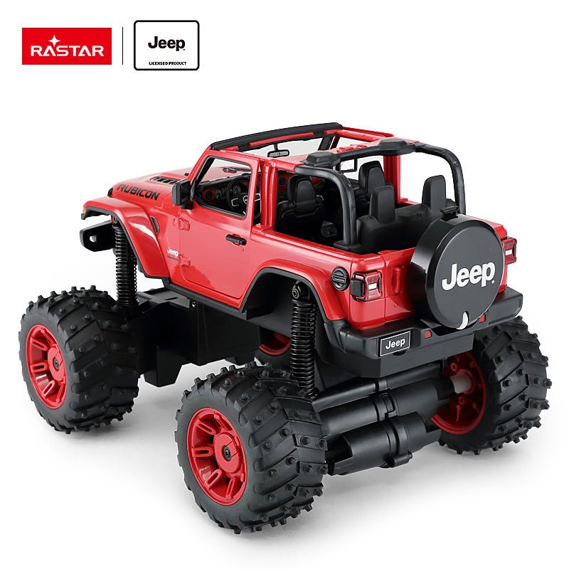 Rastar 1:14 Jeep Wrangler Rubicon Big Foot RC car in red from a rear 3/4 angle with roof removed, showing the spare tyre cover with Jeep logo, rear tail lights, and red-rimmed bigfoot tyres on extended suspension.