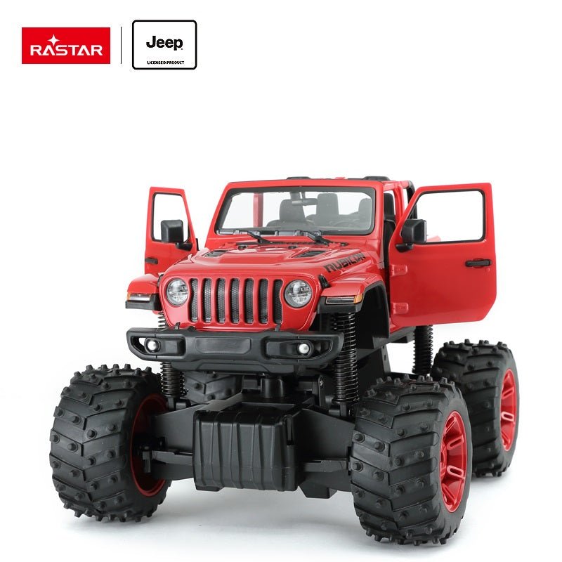 Rastar 1:14 Jeep Wrangler Rubicon Big Foot RC car in red viewed from a low front 3/4 angle with driver-side door open, showing the iconic seven-slot Jeep grille, round headlights, Rubicon bonnet graphics, and oversized bigfoot tyres with red rims; Rastar and Jeep Licensed Product logos shown.