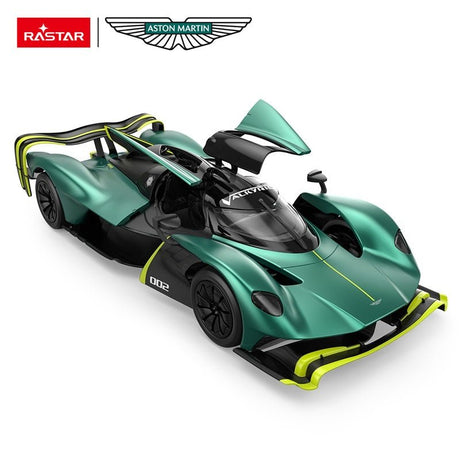 Rastar 1:14 Aston Martin Valkyrie AMR Pro RC car in racing green with neon yellow trim and number 002, viewed from a front 3/4 angle with butterfly gull-wing door open, showing the sleek Le Mans-style canopy cockpit marked "Valkyrie", carbon-effect details, large rear wing, and Aston Martin wings badge.