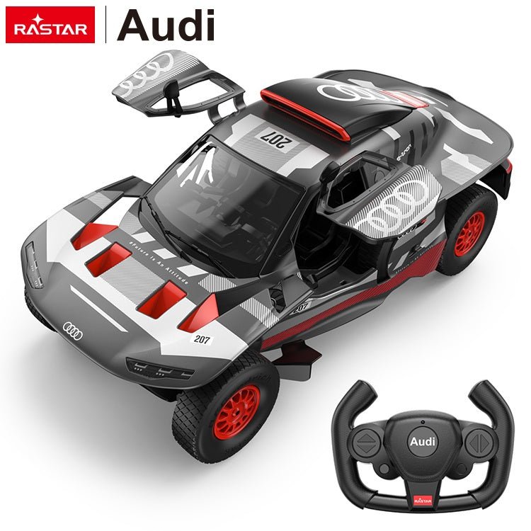 Rastar 1:14 Audi RS Q e-tron E2 RC car in grey, white and red Dakar rally livery shown in front 3/4 view with gull-wing doors open, displayed alongside its steering wheel-style 2.4GHz remote controller.
