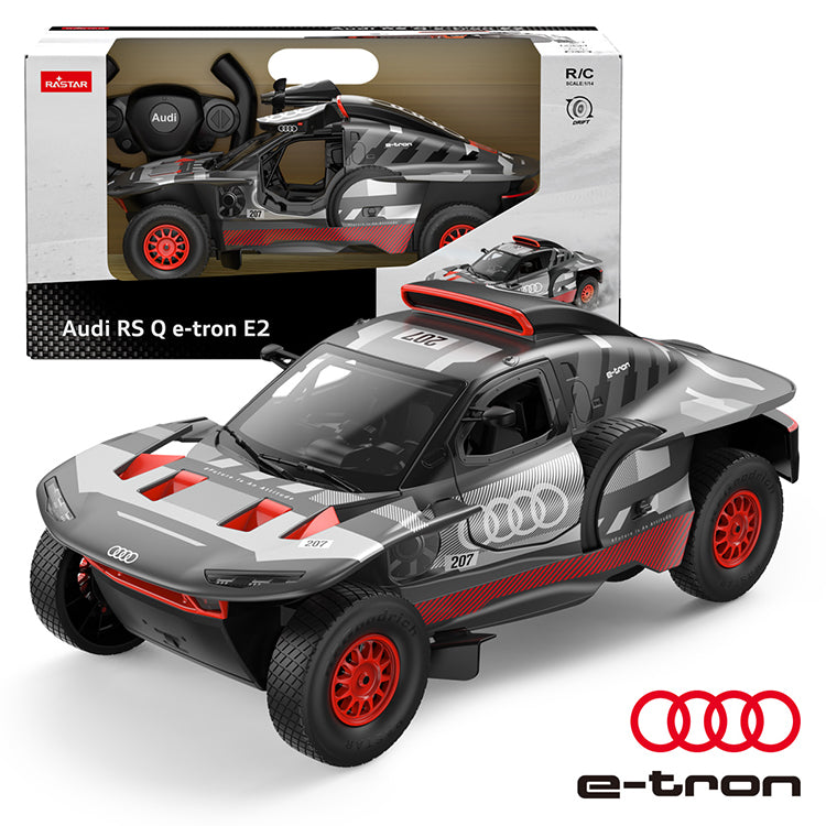 Rastar 1:14 Audi RS Q e-tron E2 RC car in Dakar grey/white/red livery shown from front 3/4 view beside its retail packaging box, with the Audi e-tron logo prominent and the R/C 1:14 scale label visible on the box.