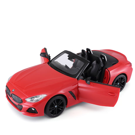 Rastar 1:14 BMW Z4 Roadster RC car in red shown from front 3/4 angle with both doors open, displaying the open-top convertible body, black interior with seats and steering wheel, and black alloy wheels.