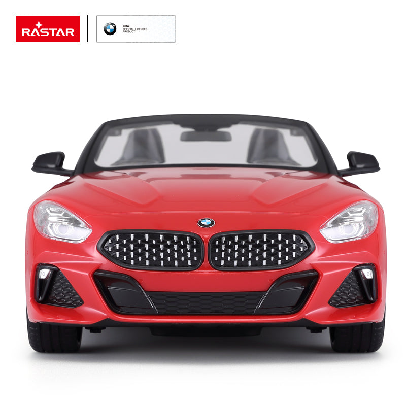 Rastar 1:14 BMW Z4 Roadster RC car in red shown front-on with the open convertible roof, prominent kidney grille, LED headlights, and BMW badge clearly visible on a white background.