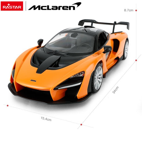 Rastar 1:14 McLaren Senna RC car in orange, front three-quarter overhead view on a white background showing the closed-door profile, rear wing, and annotated dimensions: 34 cm length, 15.4 cm width, and 8.7 cm height.