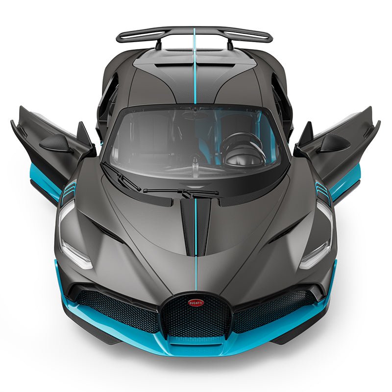 Rastar 1:14 Bugatti Divo RC car in matte grey with teal/blue accents viewed directly from above with both doors open. The top-down shot highlights the distinctive central engine cover fin, louvred rear deck, and the full extent of the wide racing body.