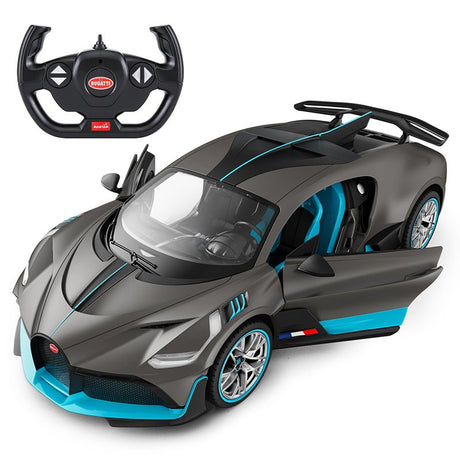 Rastar 1:14 Bugatti Divo RC car in matte grey with teal/blue accents shown from front 3/4 angle with both doors open, revealing the blue-tinted interior, alongside the Bugatti steering wheel remote controller. Opening doors and the dramatic rear wing are prominently featured.