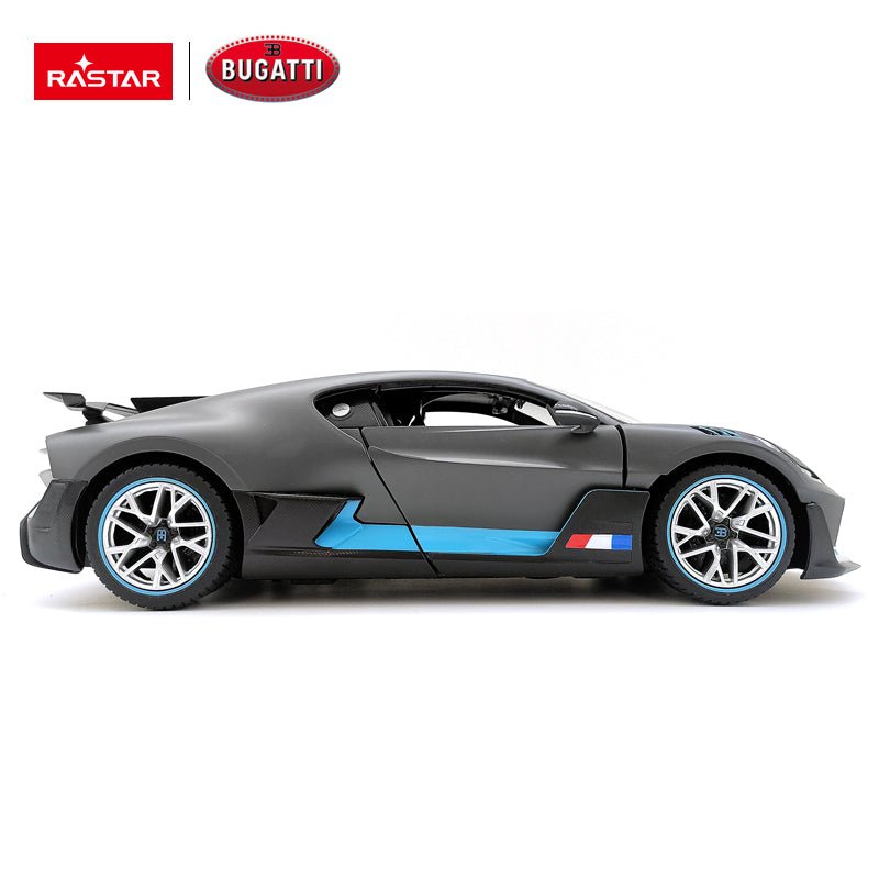 Rastar 1:14 Bugatti Divo RC car in matte grey viewed from directly overhead with doors closed. The top-down view shows the full roofline, central engine fin spine, twin rear wing elements, and the car's wide aerodynamic body shape.
