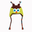 Crocheted owl hat with large embroidered eyes, a small orange beak, brown ear covers, and braided ear ties in blue, orange, and brown on a white background.