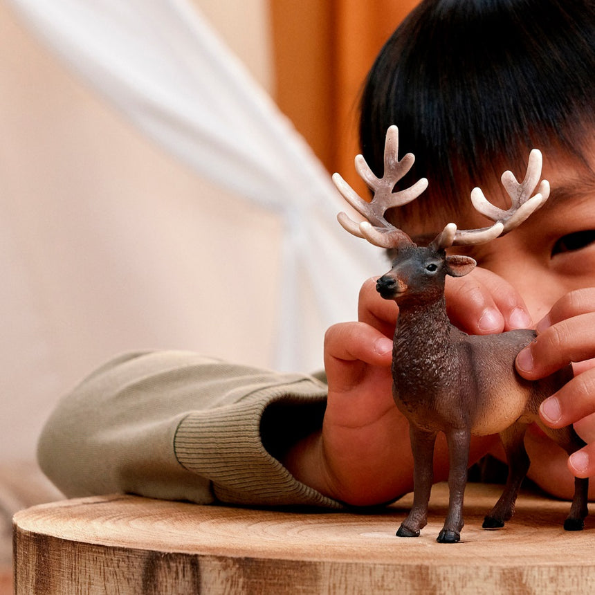 Schleich Elk toy figure in play scene