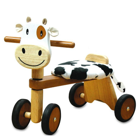 Side view of I'm Toy Paddie Rider Calfie sustainable rubberwood trike
