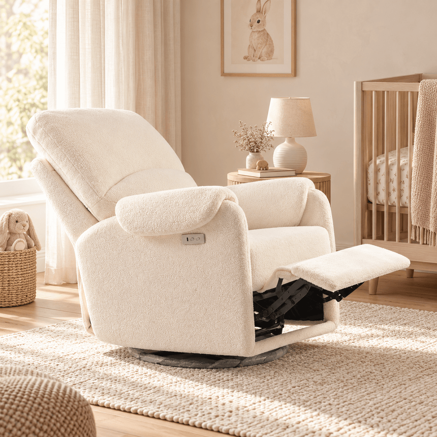 Ivory cream lamb fleece glider recliner reclined in a nursery setting