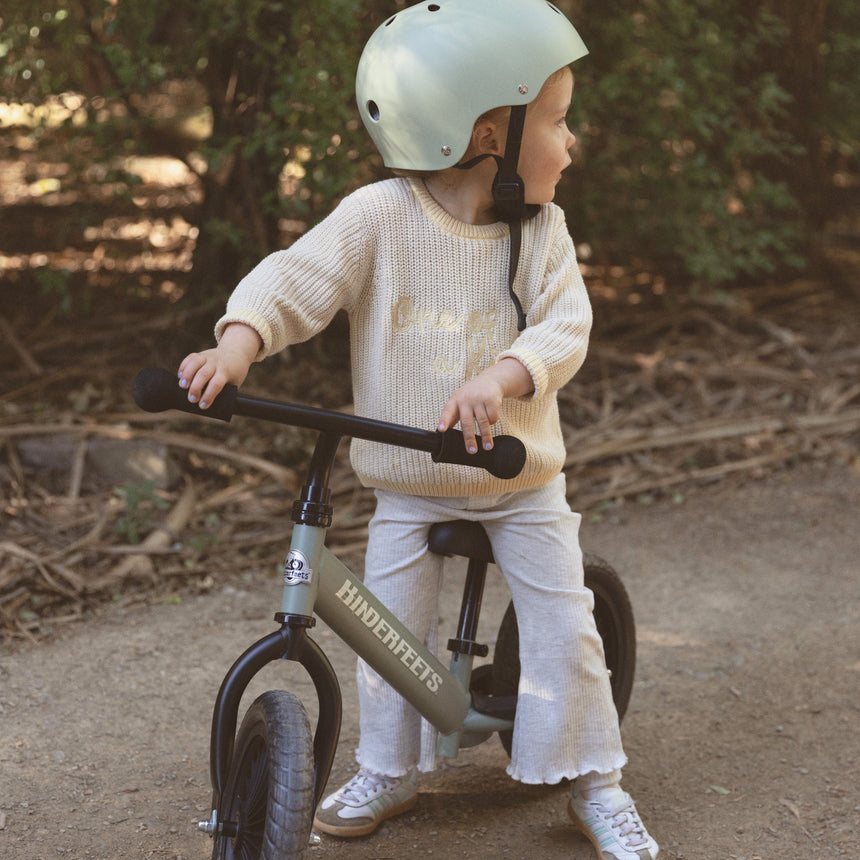 Kinderfeets Trail Bike Silver Sage being ridden outdoors