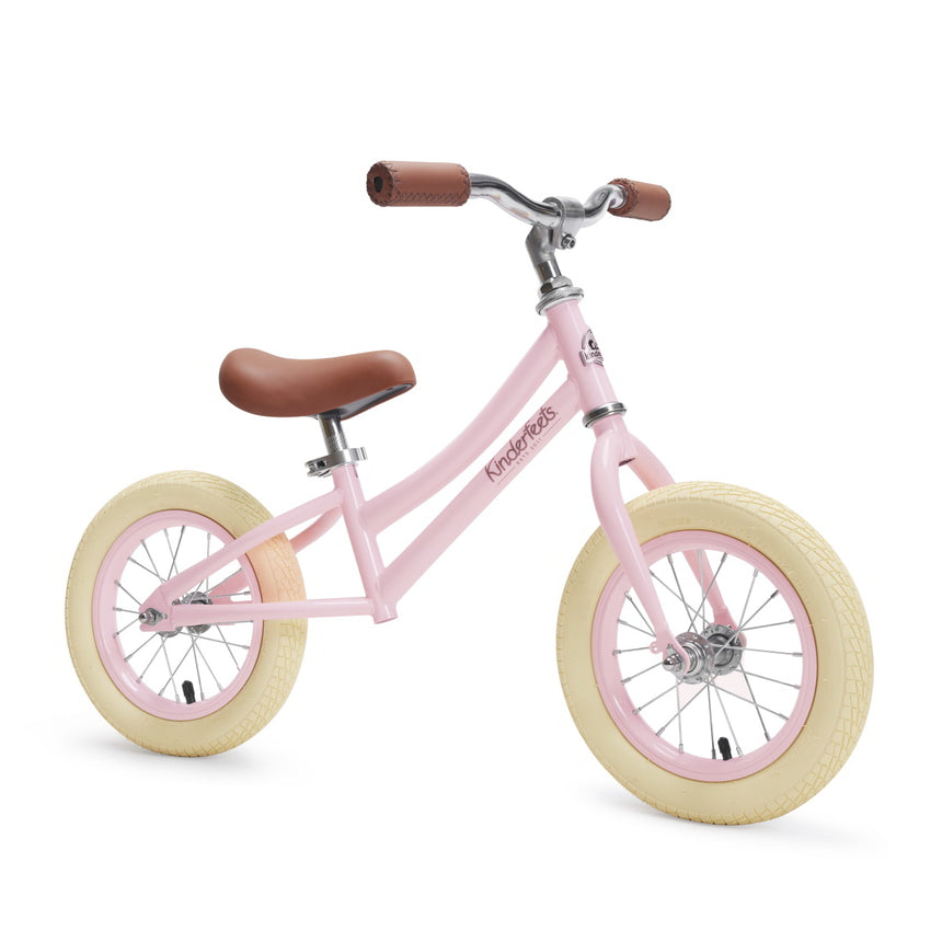 Kinderfeets City Bike in Rose – soft pink retro metal balance bike with cream air tyres and brown seat