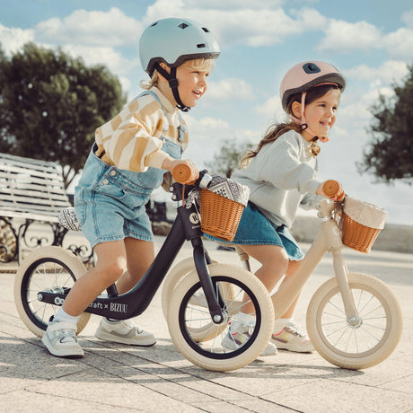 Kinder Kraft Rapid 2 Whisper Dune balance bike at the park, first bike for ages 2+