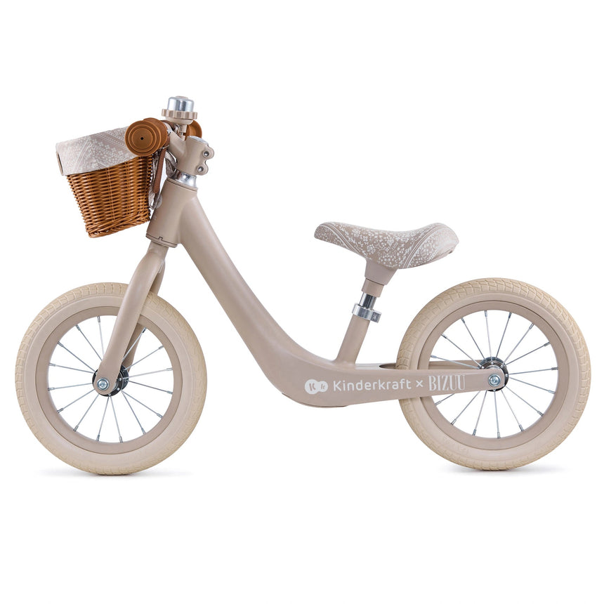Wicker basket on the front of the Kinder Kraft Rapid 2 Whisper Dune balance bike