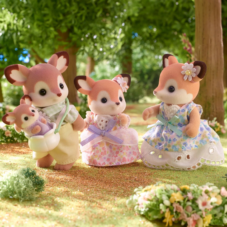 Sylvanian Families Deer Family group portrait in a garden setting