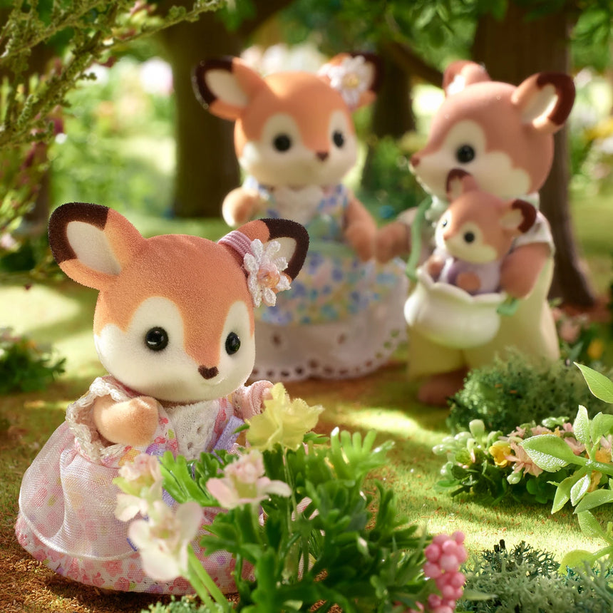 Sylvanian Families Deer Family baby and parents in a woodland play scene