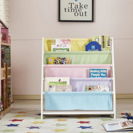 Front view of the Charlie White canvas sling bookcase with front-facing books on pastel fabric tiers